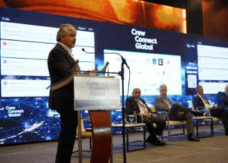 A speaker on stage at Seatrade Maritime CrewConnect Global 
